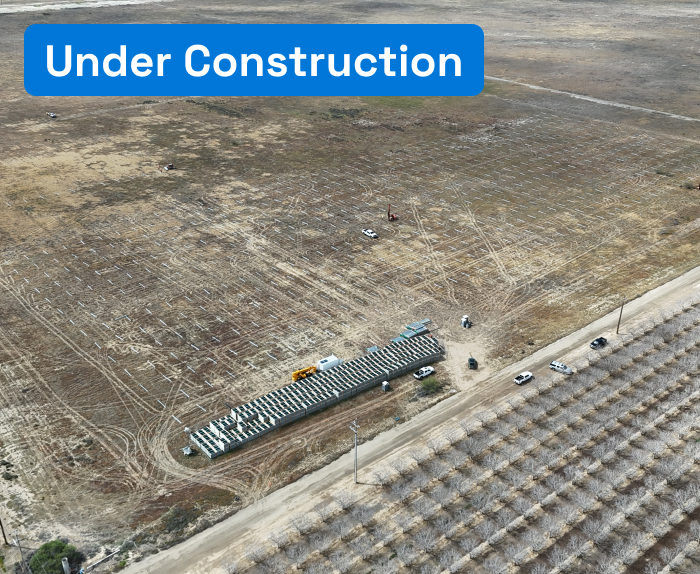 Aerial view of barren land being prepared for solar installation.